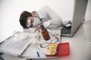 6990615-sick-man-sleeping-on-office-table